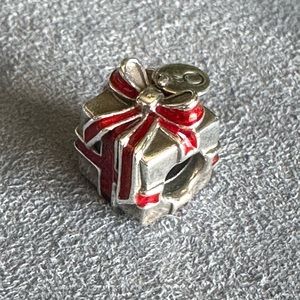 Pandora 2012 Black Friday 100% authentic retired silver with red enamel charm.
